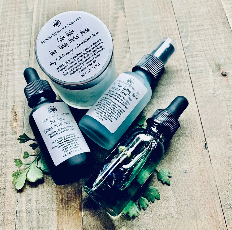 The Blue Tansy Collection Gift Set which included a 2 ounce calming balm, a 1 ounce herbal facial oil and 1 ounce Blue Tansy Iridescent Facial Toner