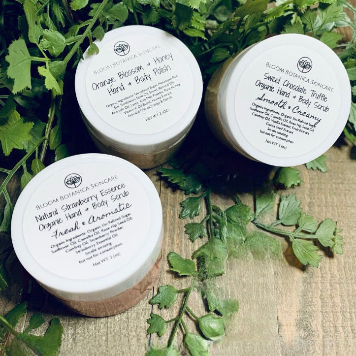 Set of three lovely sugar scrubs displayed beautifully. Healthy Shea Butter and oils, smooth your skin while sugar exfoliates dry, ashy skin leaving your skin soft, smooth and hydrated.In this set you receive Orange Blossom, & Honey, Fresh Picked Strawberries and Sweet Chocolate Truffle.